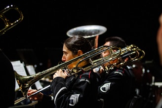 a group of people playing musical instruments in a band