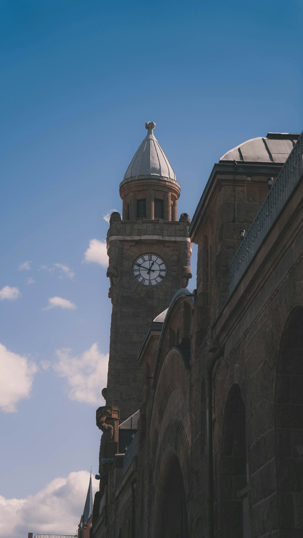 a clock tower on the side of a building