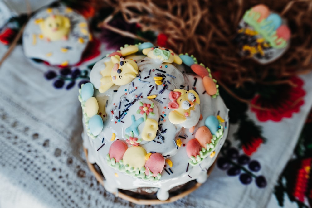 a decorated cake sitting on top of a table