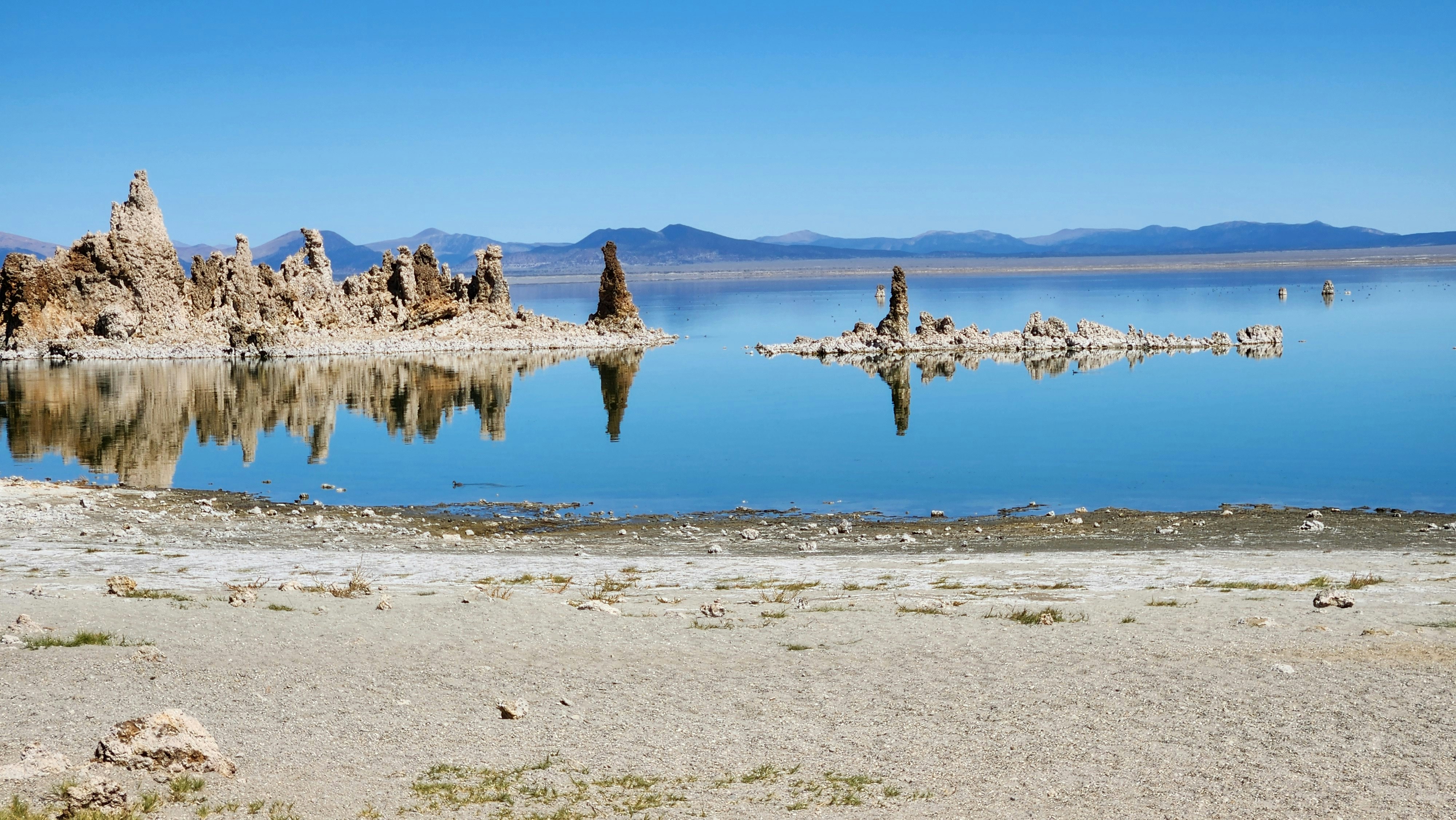a large body of water surrounded by mountains
