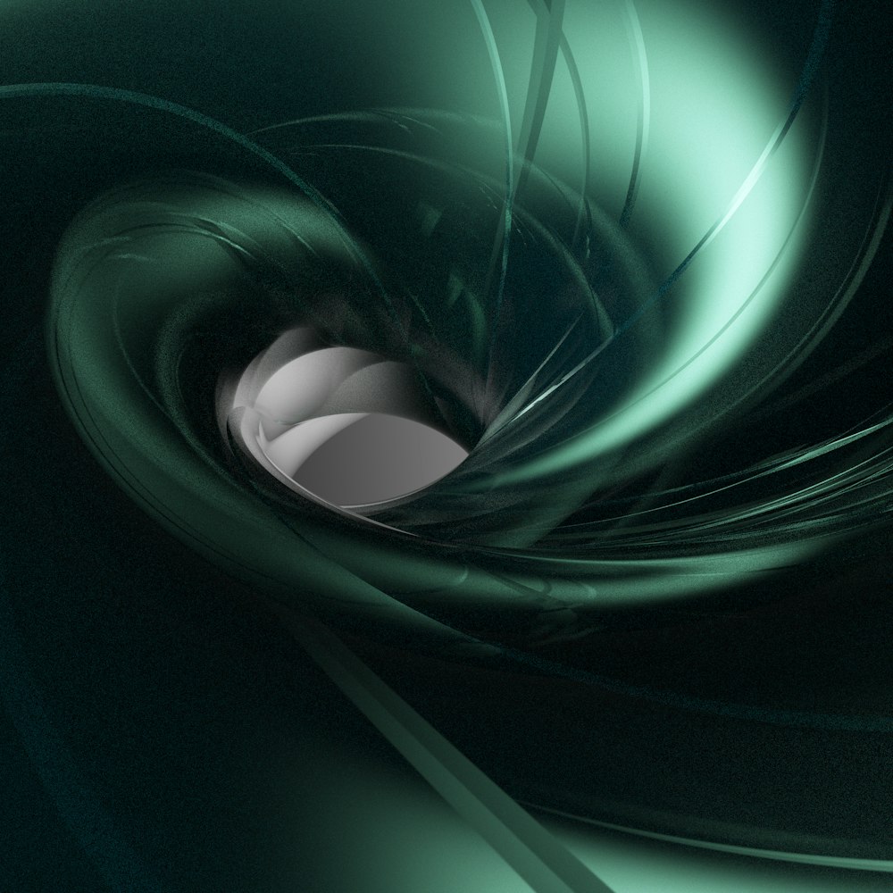 a black and white photo of a green swirl
