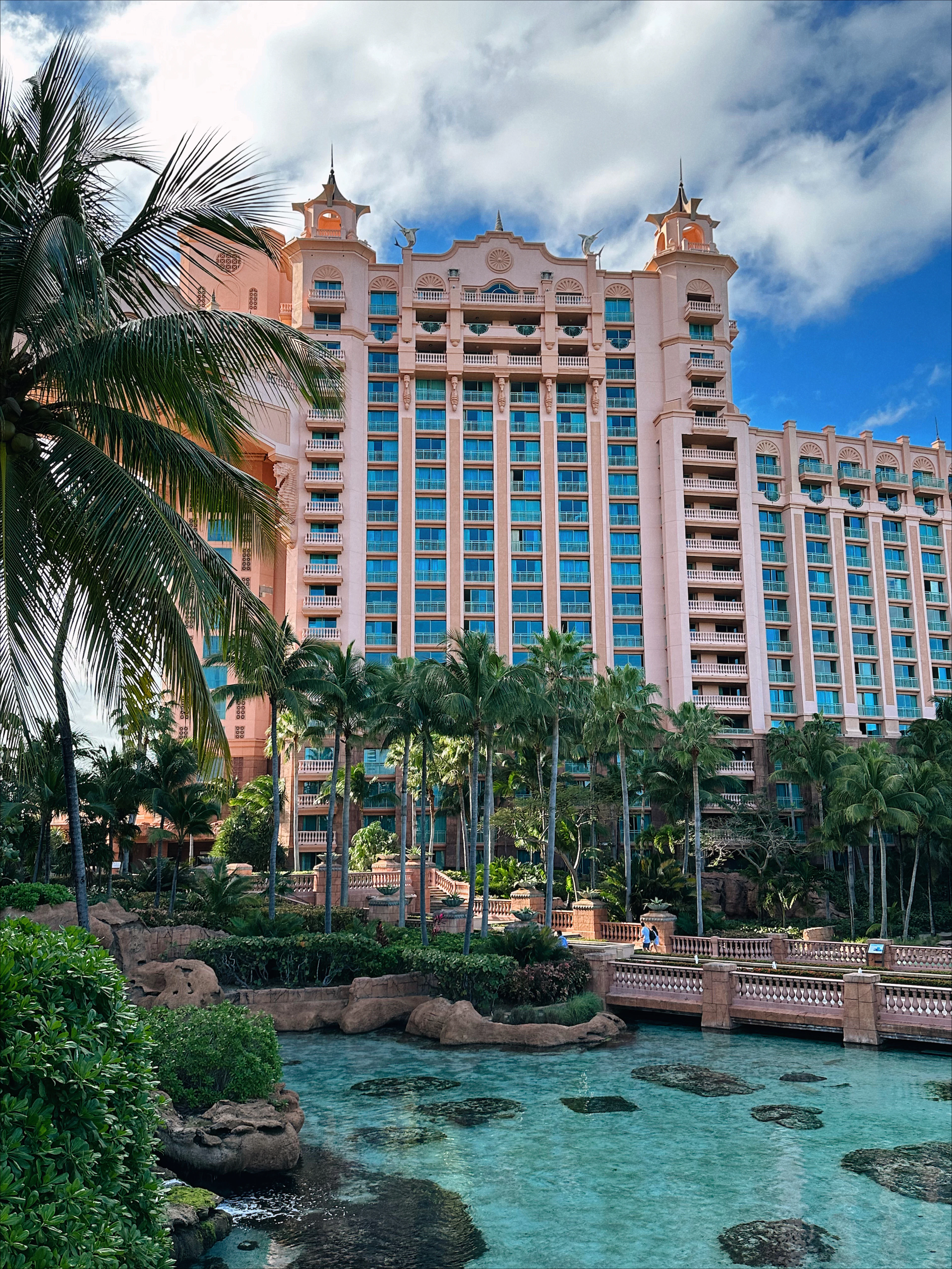 Resort towers above a lagoon pool on Paradise Island