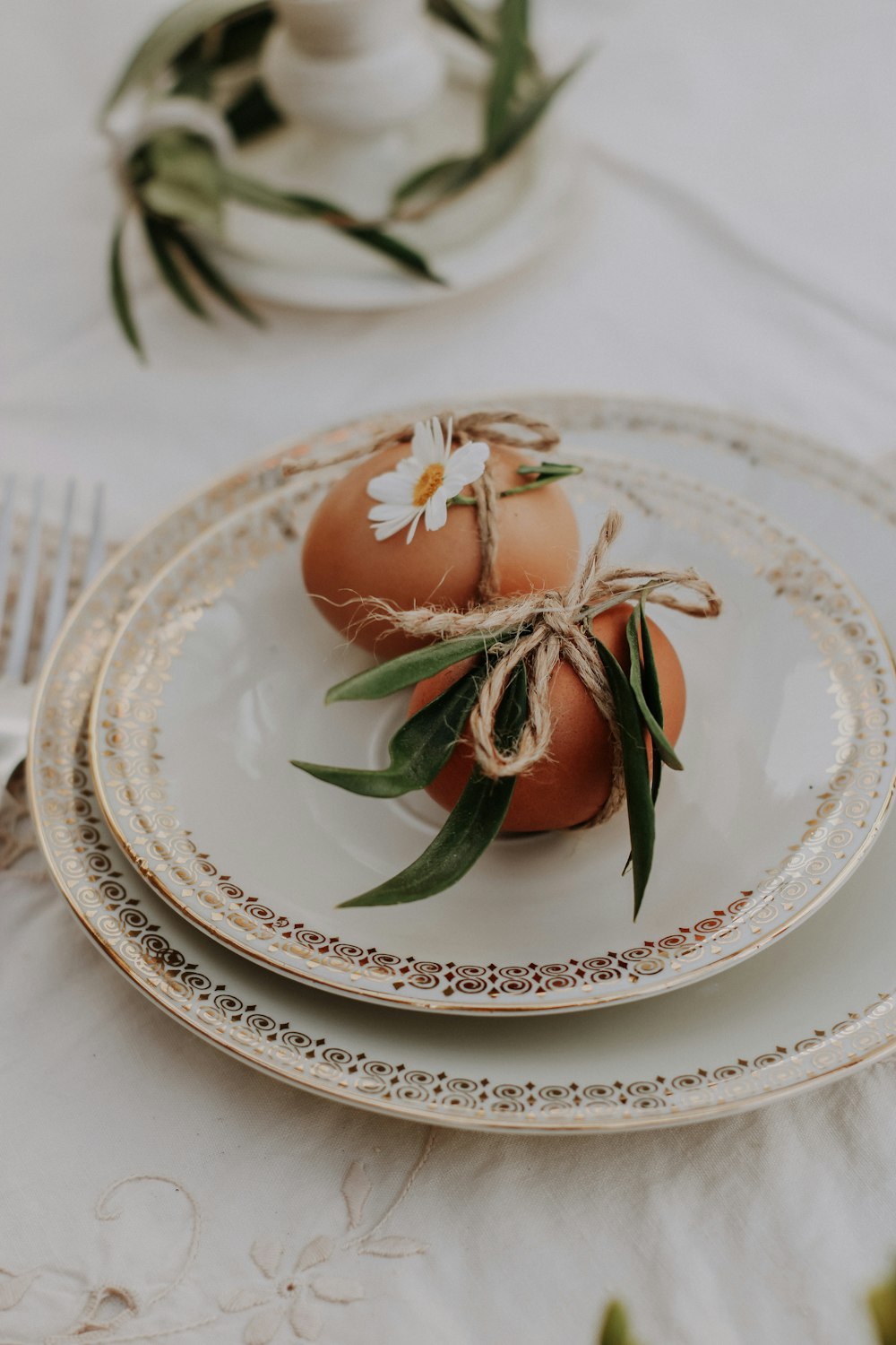 a plate with three eggs on it on a table