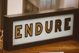 a close up of a sign on a table