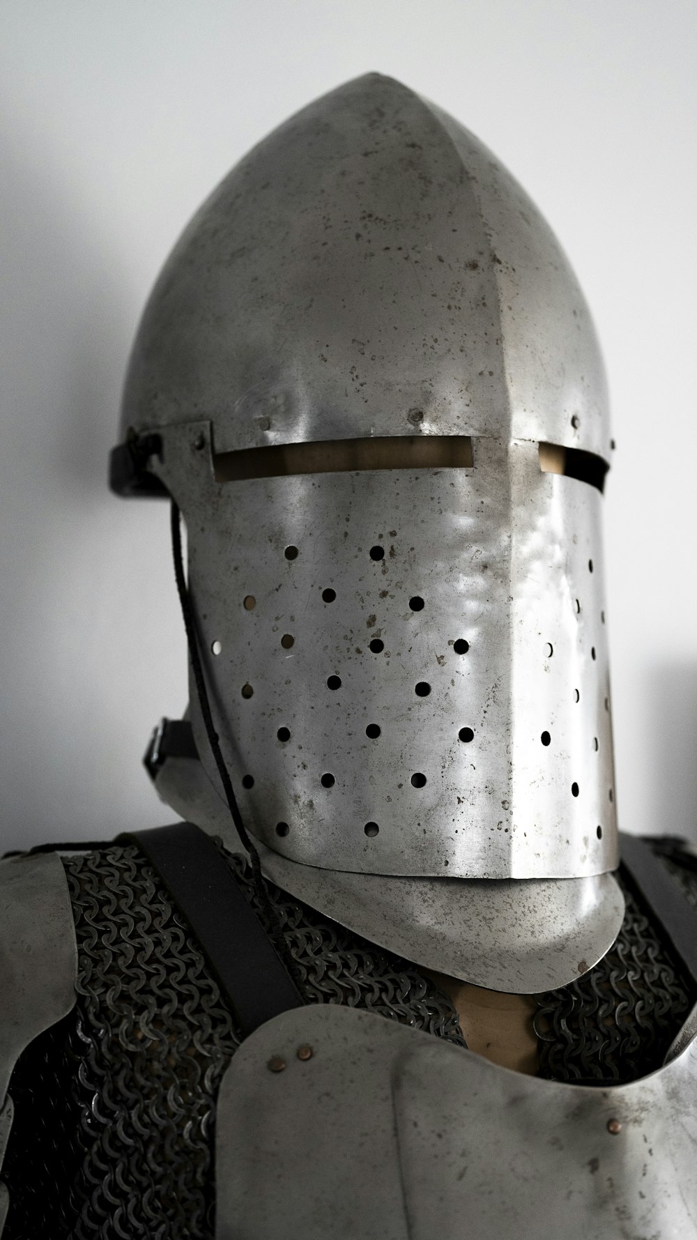a close up of a knight's helmet and armor