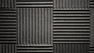 Close-up of textured acoustic panels enhancing sound quality in a stylish environment.