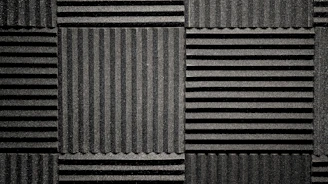 A collection of stylish acoustic panels on a wall.