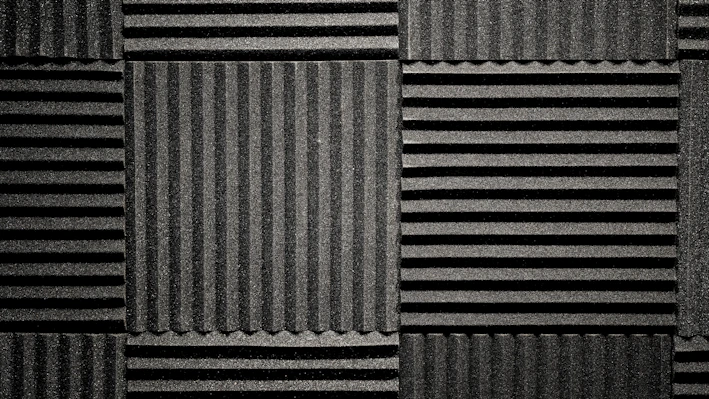 A collection of stylish acoustic panels on a wall.