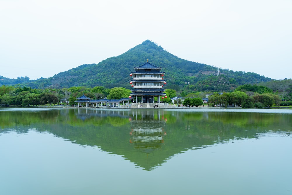 a large body of water with a building on top of it