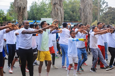 a group of people standing around each other