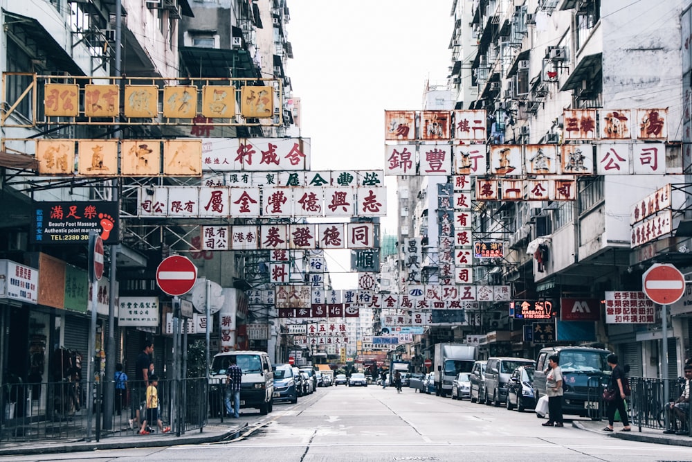 a city street filled with lots of tall buildings