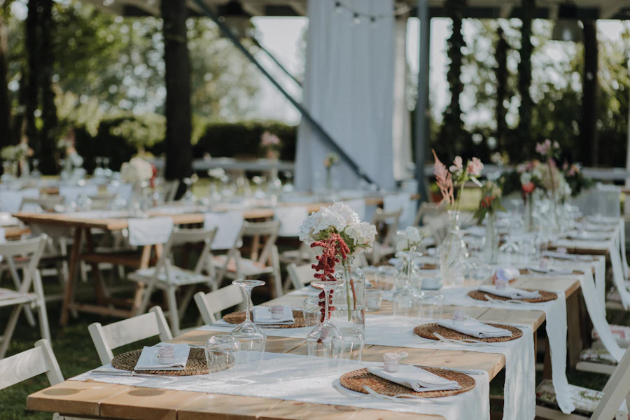 A long table set for a wedding dinner
