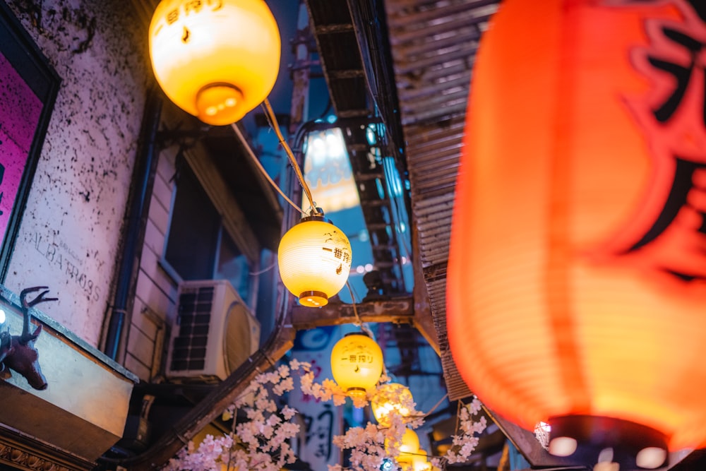 a group of lights hanging from the ceiling of a building