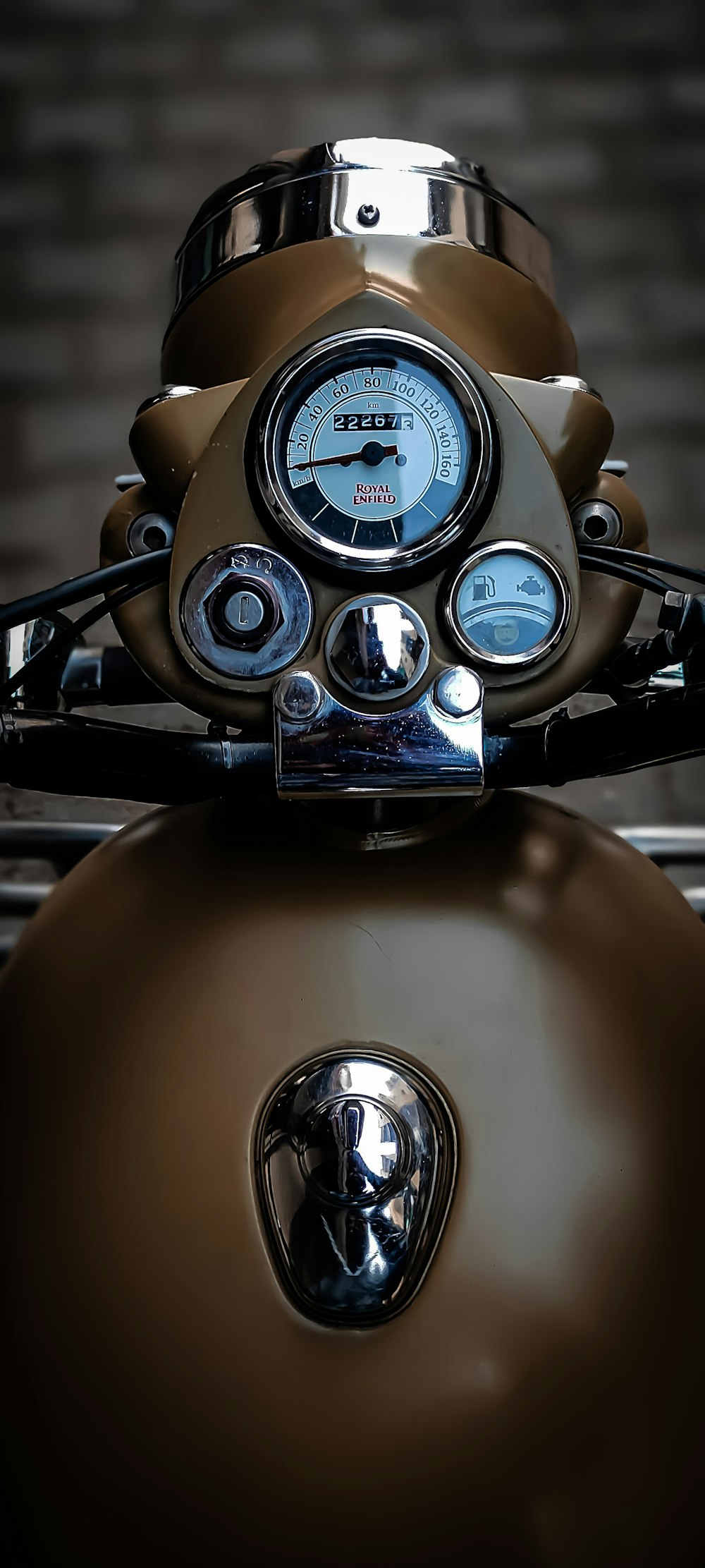 a close up of a motorcycle with a speedometer