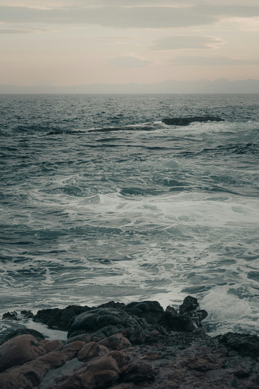 a black and white photo of the ocean