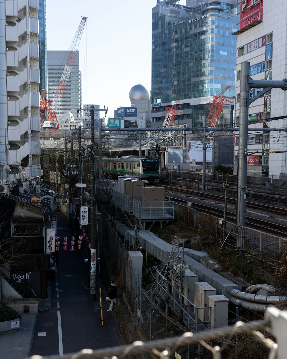 a view of a train track in a city