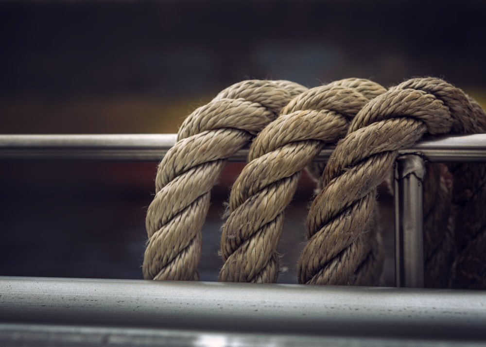 a close up of a rope on a rail