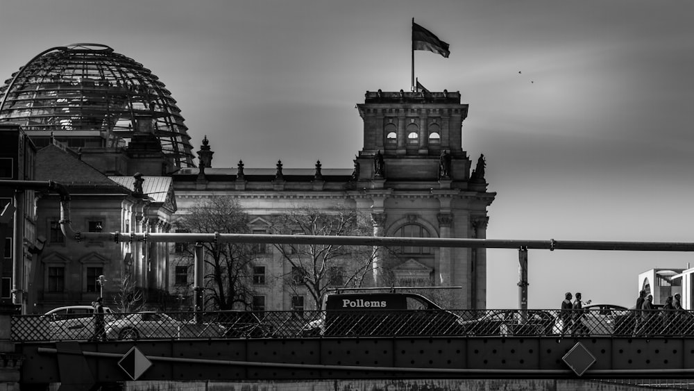 a black and white photo of a large building