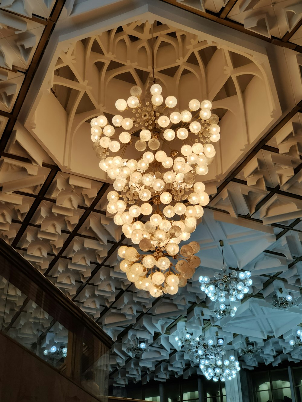 a chandelier hanging from the ceiling of a building