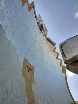 a skateboarder is doing a trick on a half pipe