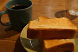 A warm morning scene with Estikana mugs filled with tea on a breakfast tray