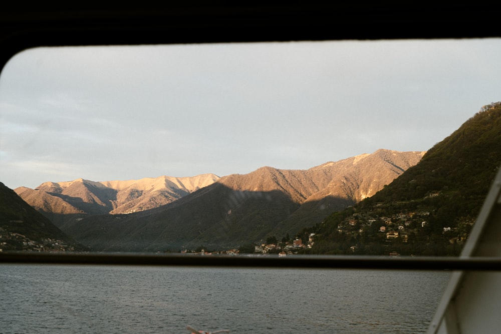 a view of a mountain range from a boat