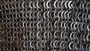 a close up of a chain link fence