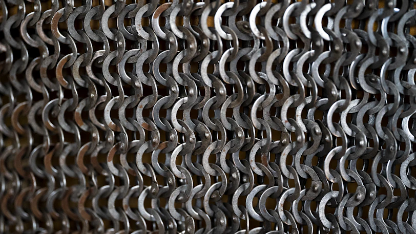 a close up of a chain link fence