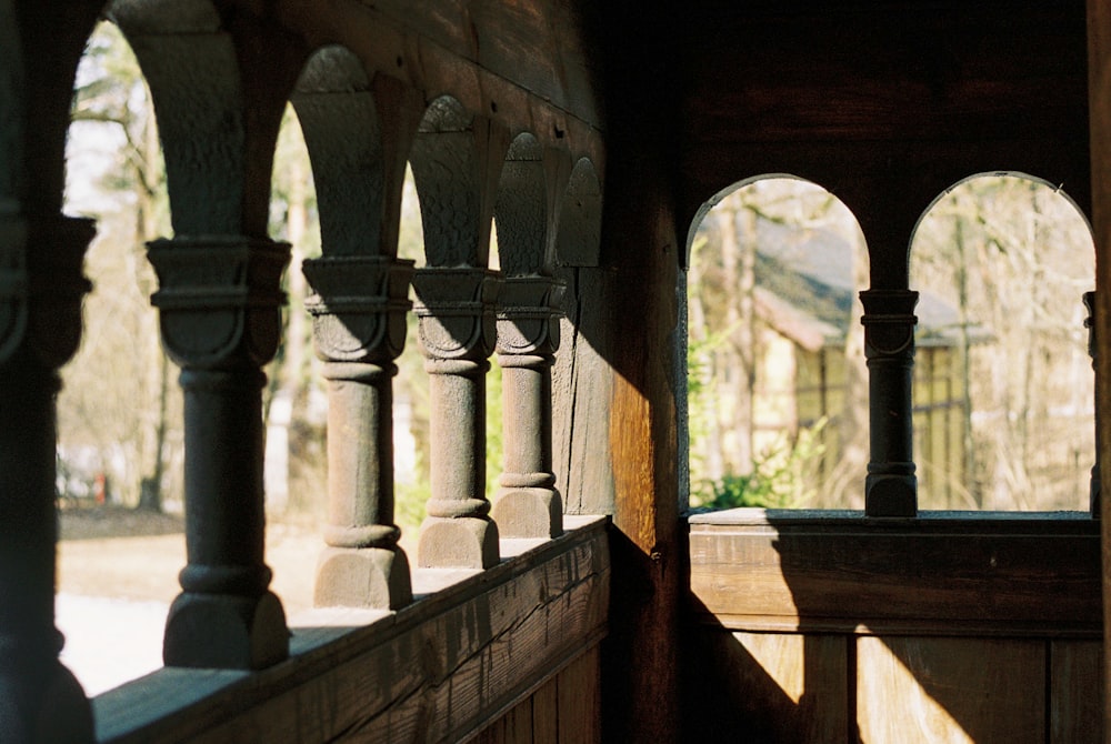 a view of a building through an arched window