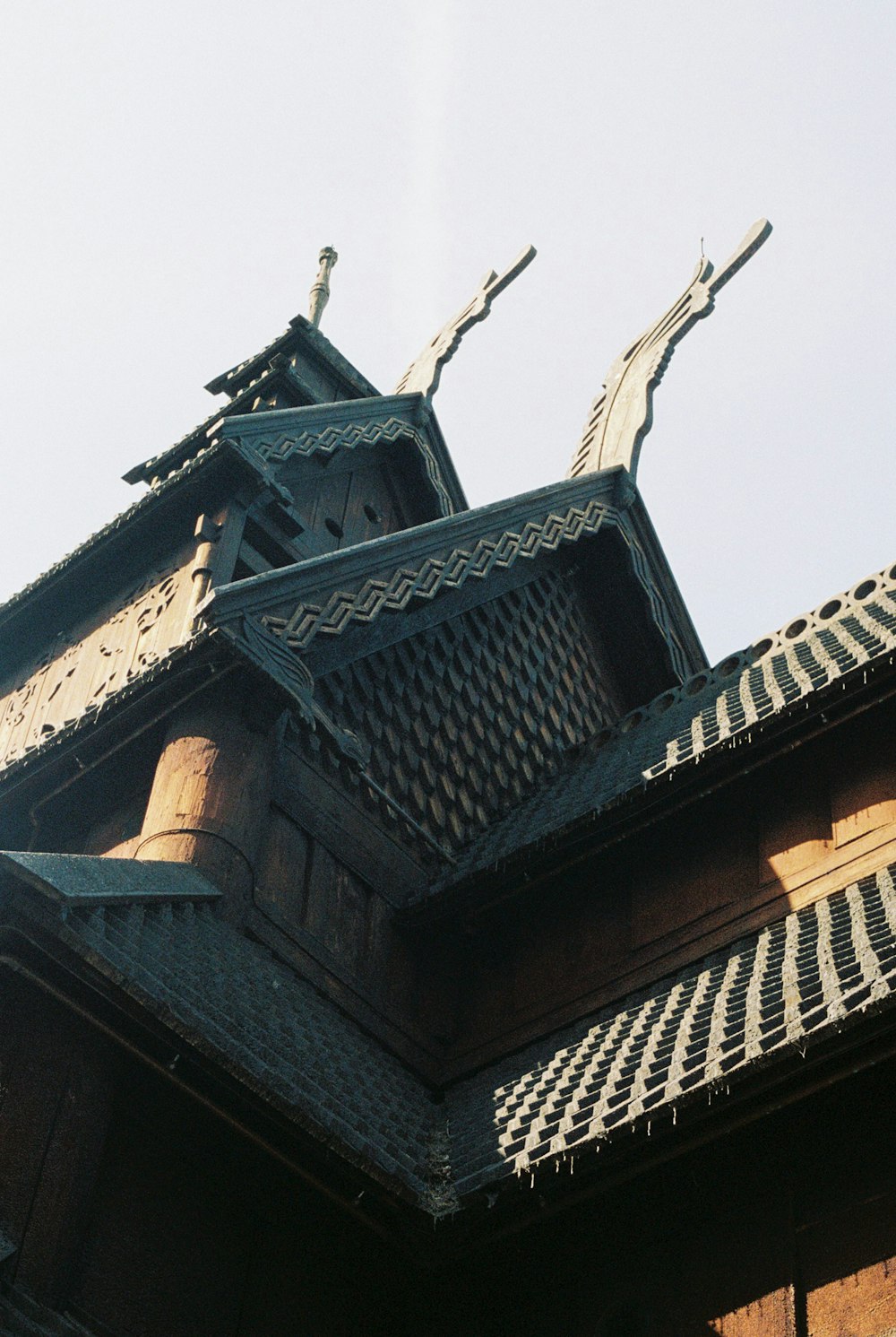 the roof of a building with a clock on it