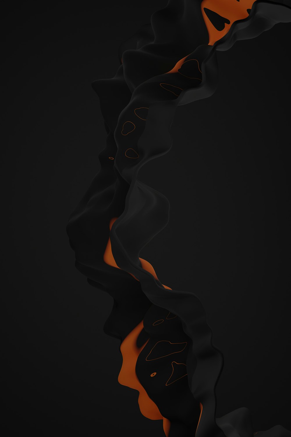 a black background with orange swirls and a black background