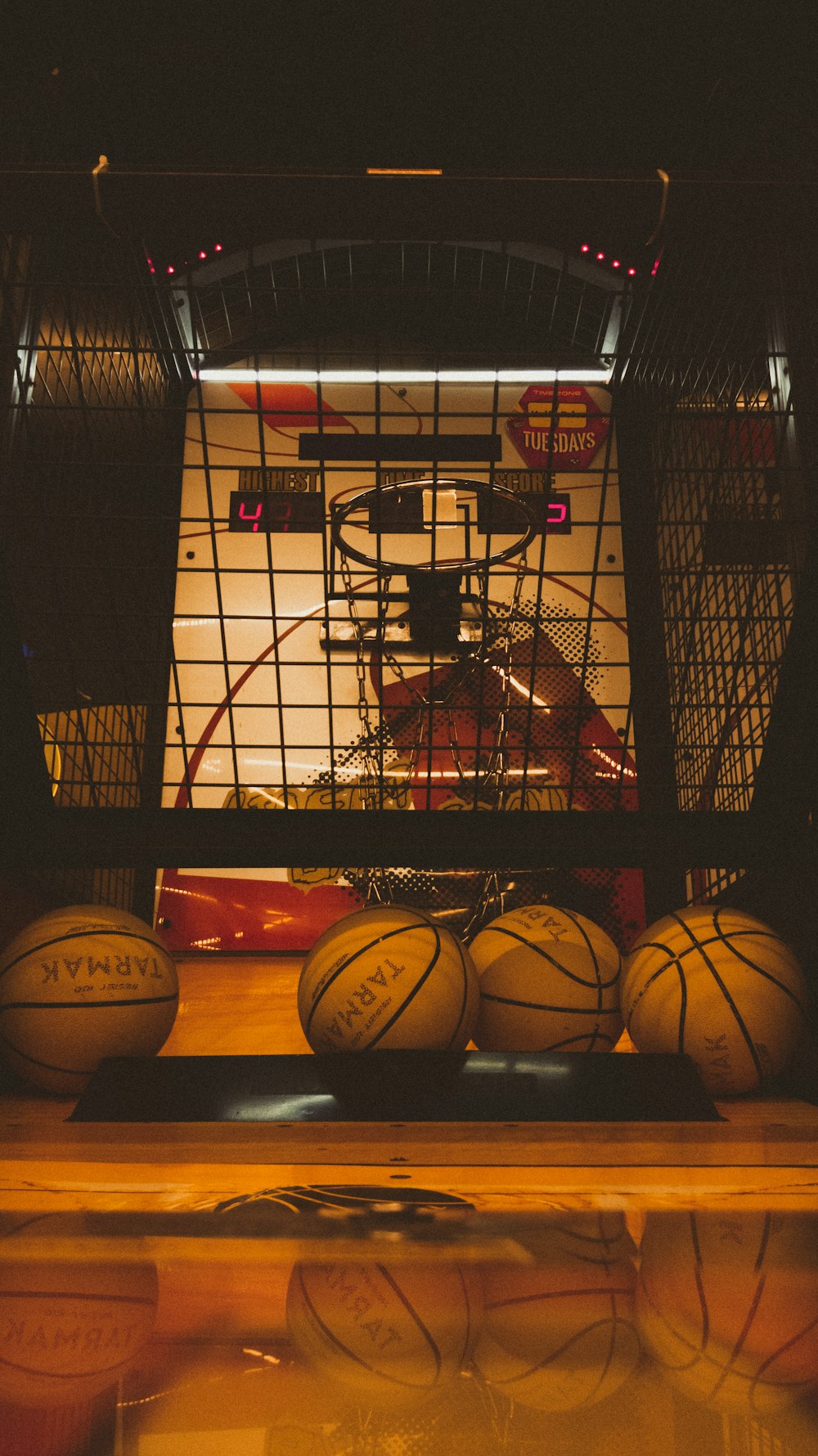 a group of basketballs sitting on top of a table