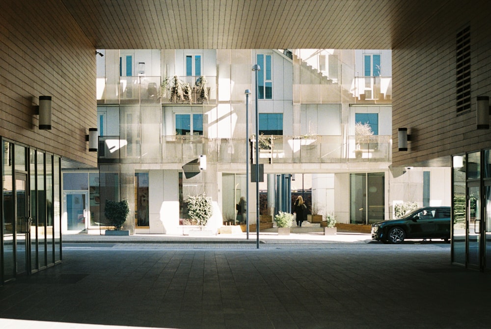 a car is parked in front of a building