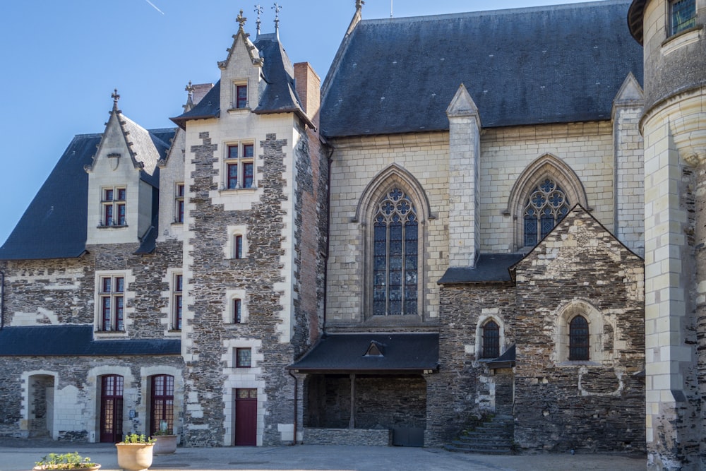 a large stone building with a clock tower