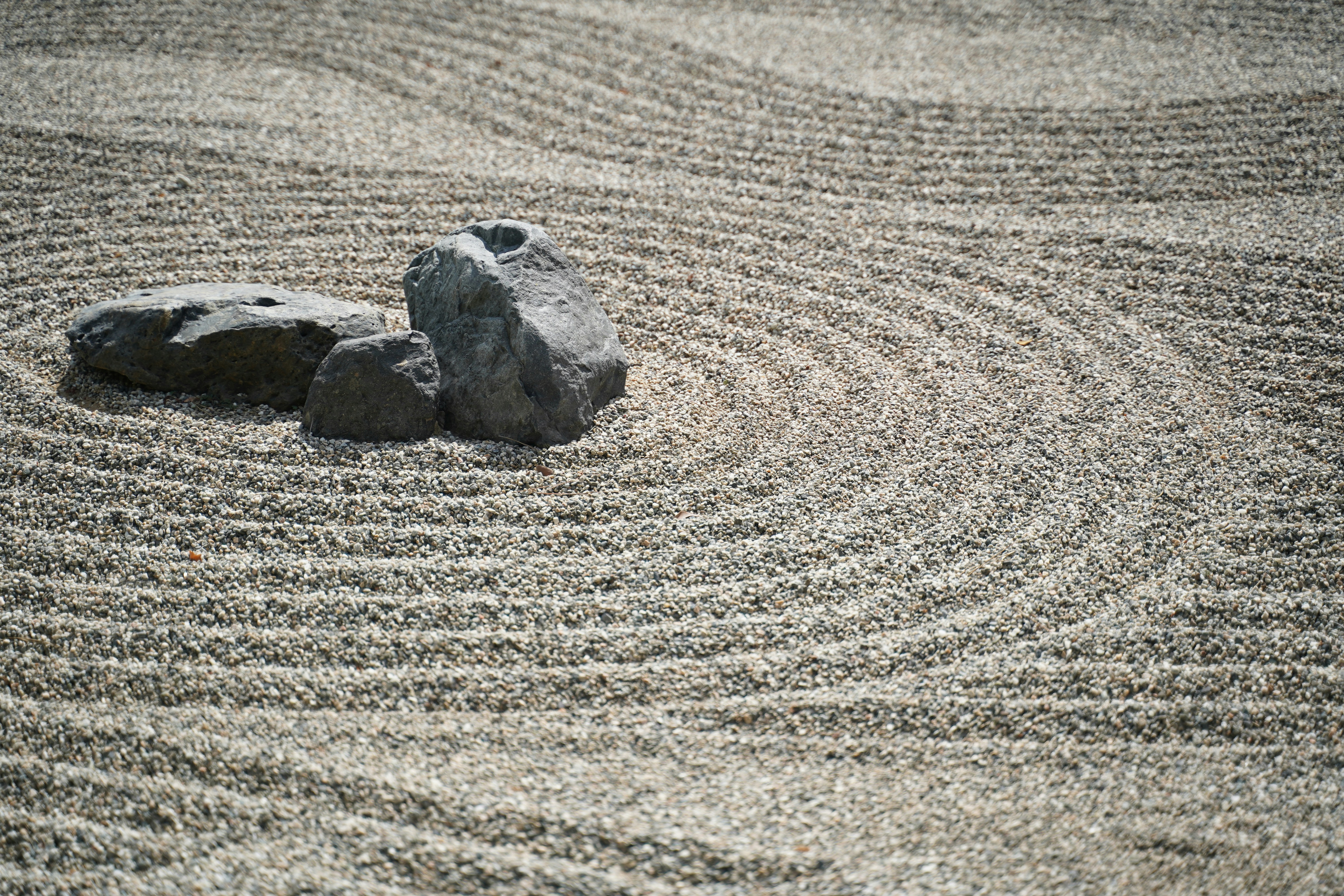 Two rocks sitting on top of a sandy ground photo – Free Road Image on ...