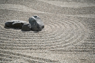 Minimalist interface of a relaxing zen garden simulation game.