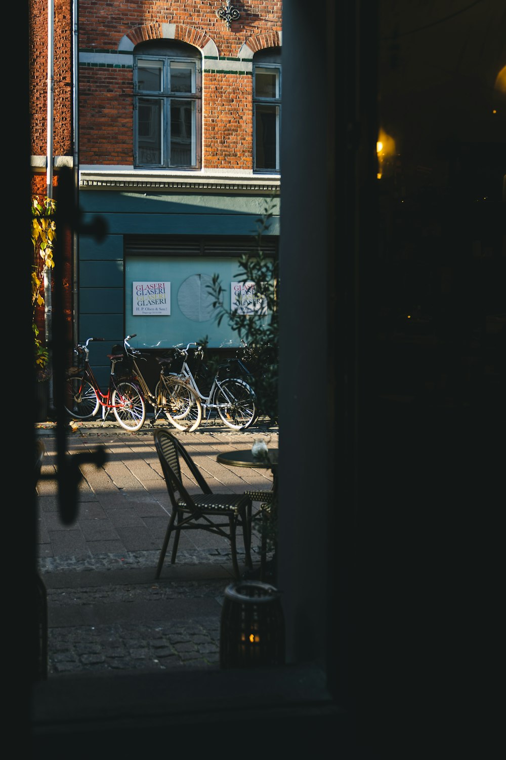 a group of bikes parked in front of a building