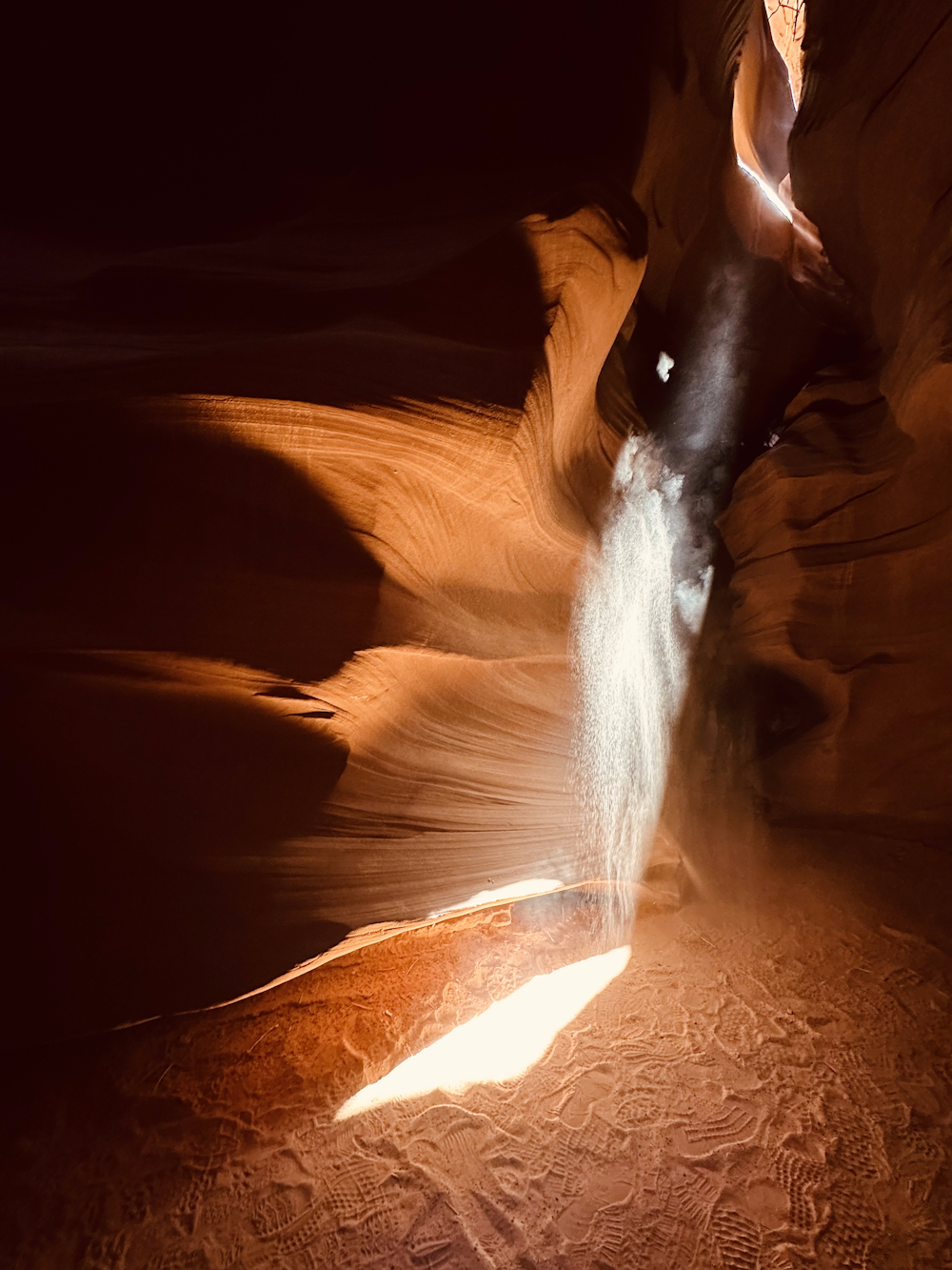 a person standing in the middle of a desert