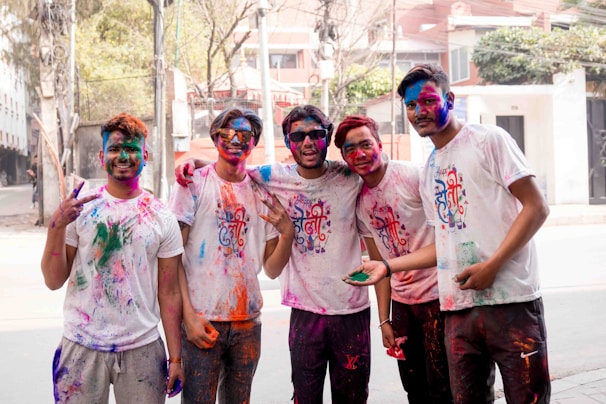 a group of young men standing next to each other