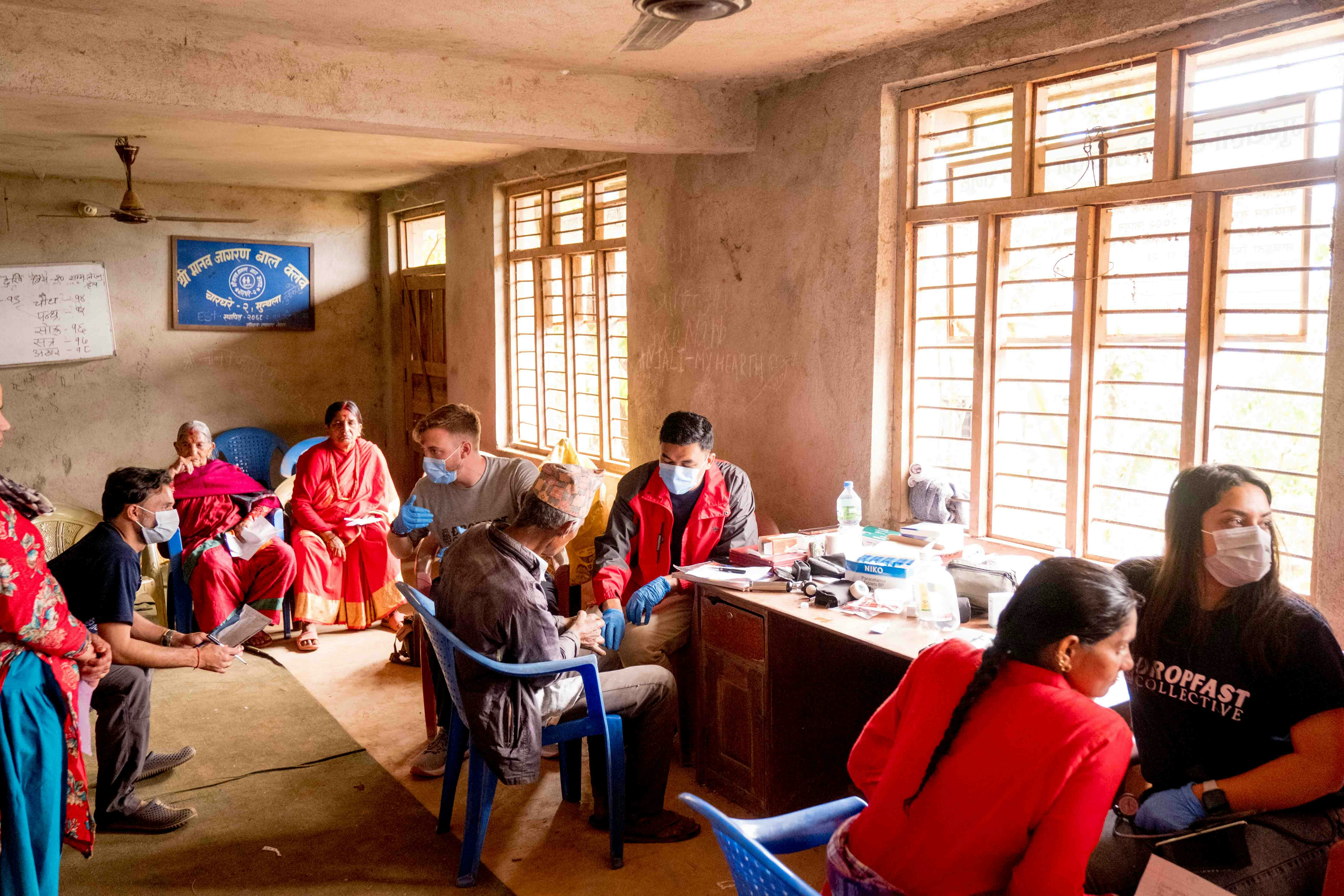 a group of people sitting in a room