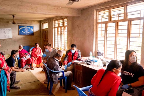 a group of people sitting in a room