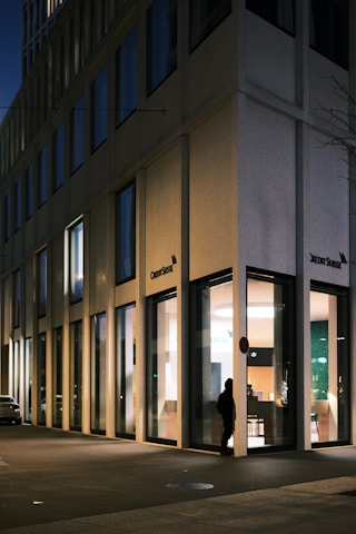 A sleek, modern security office at night, showcasing vigilance.