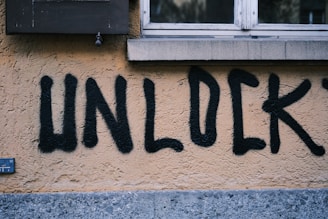 a wall that has some writing on it