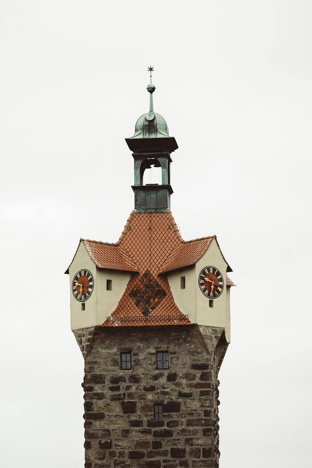 a tall tower with a clock on top of it