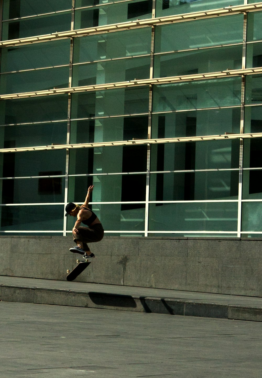 a man riding a skateboard up the side of a ramp