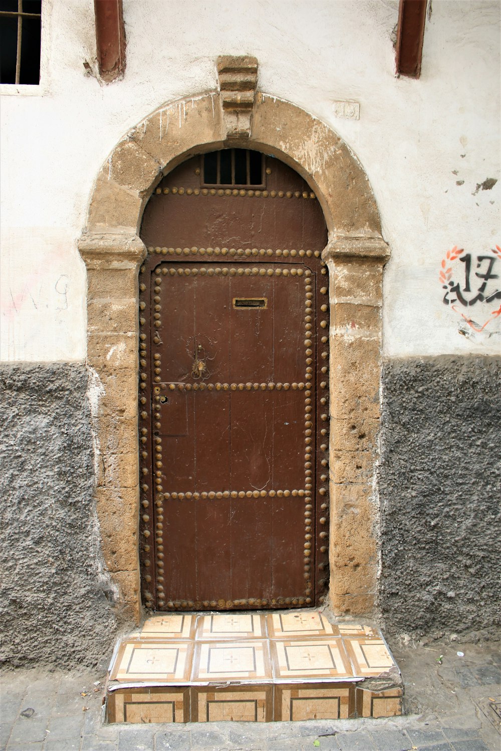 a door with a bench in front of it