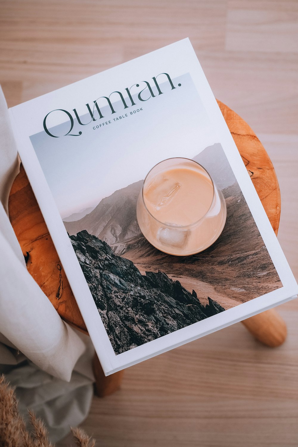 a magazine sitting on top of a wooden table