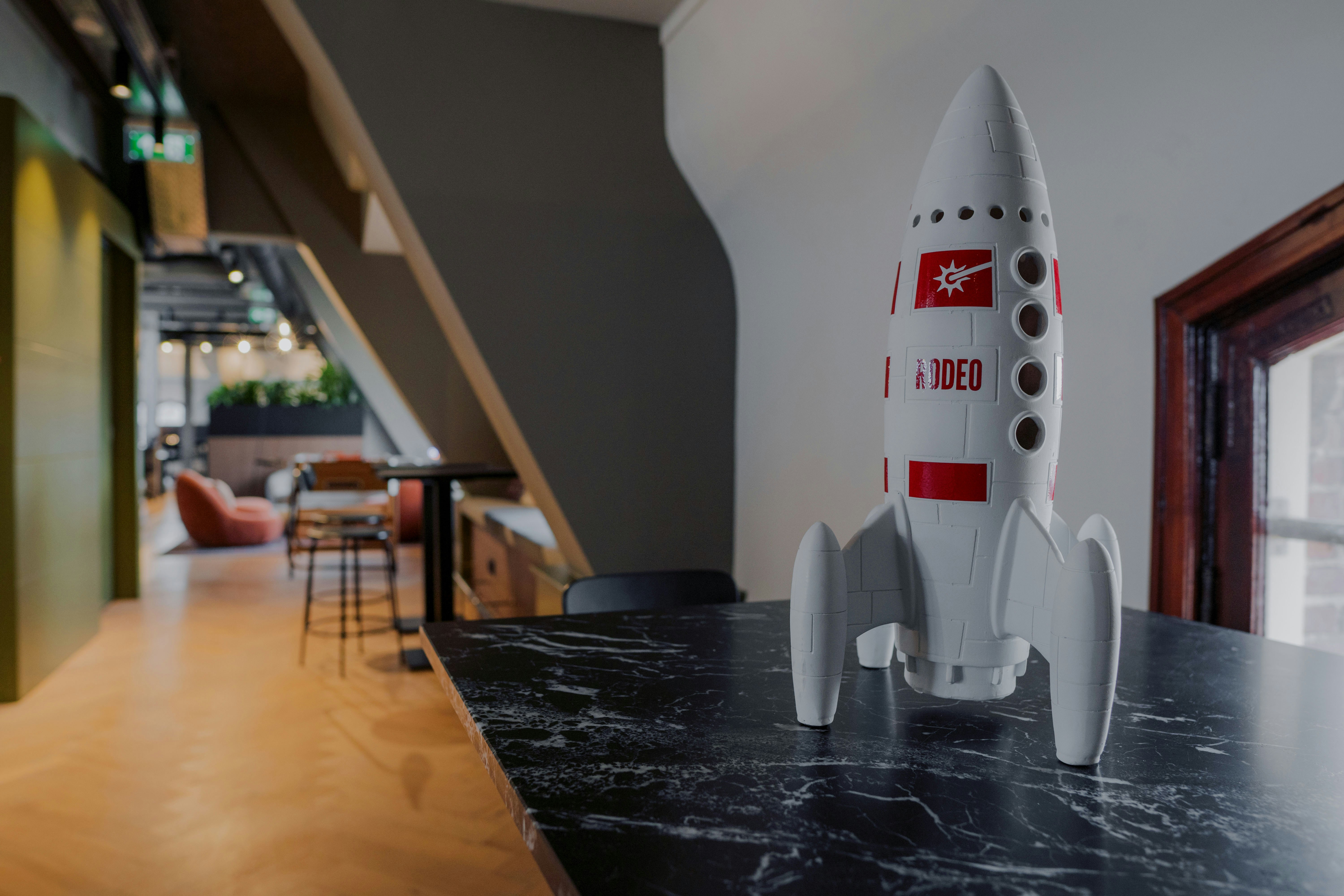 a model of a rocket sitting on top of a table