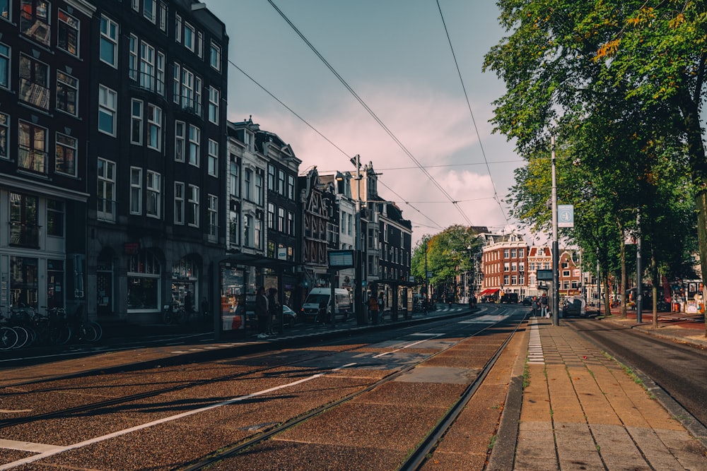 a city street with a train on the tracks