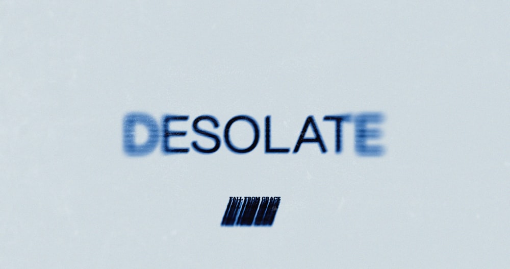 a close up of the word desolate on a white background